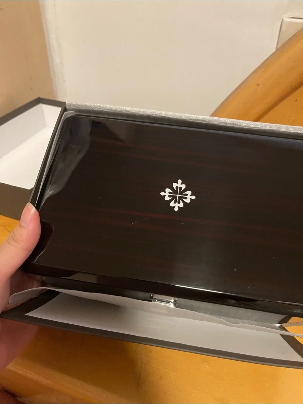 Patek Philippe Brown Wood-Pattern Watch Box with Silver Emblem